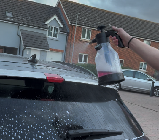 Spraying the rear window and roof