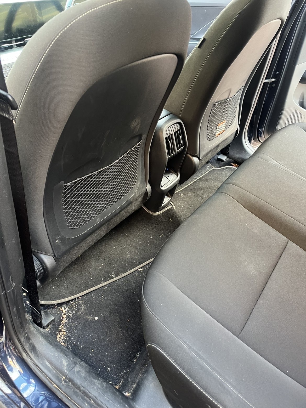Rear footwell with dirt before detailing
